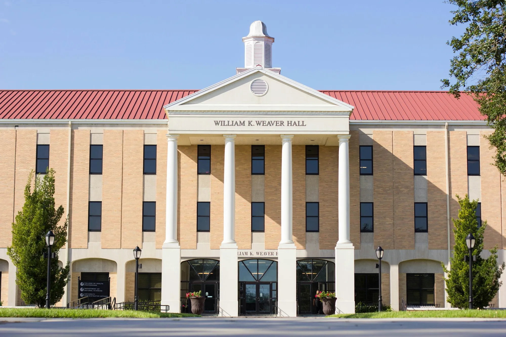 Brick municipal-style building with columns